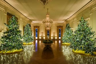 WASHINGTON, DC - NOVEMBER 30: Christmas decorations are displayed in the East Room of the White House on November 30, 2020 in Washington, DC. This year's theme for the White House Christmas decorations is "America the Beautiful." (Photo by Drew Angerer/Getty Images)
