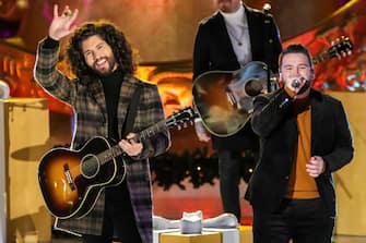NEW YORK, NEW YORK - DECEMBER 02: Dan Smyers and Shay Mooney of Dan + Shay perform during the 88th Annual Rockefeller Center Christmas Tree Lighting Ceremony at Rockefeller Center on December 02, 2020 in New York City. (Photo by Cindy Ord/Getty Images)