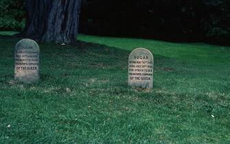 515875352 SANDRINGHAM, UNITED KINGDOM - JANUARY 01: Graves for Susan, Sugar and Heather, the Queen's pet corgis, buried on the Sandringham estate photographed on January 01, 1980 in Sandringham, England.(Photo by Anwar Hussein/Getty Images)