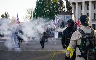 OLYMPIA, WA - DECEMBER 12: Trump supporters approach counter-protesters during political clashes on December 12, 2020 in Olympia, Washington. Far-right and far-left groups squared off near the Washington State Capitol following violent clashes over the previous weekend. (Photo by David Ryder/Getty Images)