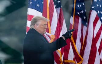 epa08923126 US President Donald J. Trump attends a rally on the Ellipse near the White House in Washington, DC, USA, 06 January 2021. Right-wing conservative groups are protesting against Congress counting the electoral college votes. Dozens of state and federal judges have shot down challenges to the 2020 presidential election, finding the accusations of fraud to be without merit.  EPA/MICHAEL REYNOLDS