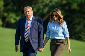 -Washington, DC - 20190804 United States President Donald J. Trump and first lady Melania Trump arrive back at the White House following a weekend at the Trump National Golf Club in Bedminster, New Jersey.

-PICTURED: President Donald Trump, Melania Trump
-PHOTO by: Tasos Katopodis/CNP/startraksphoto.com
-sized_080519_Trump-Arrival_005

This is an editorial, rights-managed image. Please contact Startraks Photo for licensing fee and rights information at sales@startraksphoto.com or call +1 212 414 9464 This image may not be published in any way that is, or might be deemed to be, defamatory, libelous, pornographic, or obscene. Please consult our sales department for any clarification needed prior to publication and use. Startraks Photo reserves the right to pursue unauthorized users of this material. If you are in violation of our intellectual property rights or copyright you may be liable for damages, loss of income, any profits you derive from the unauthorized use of this material and, where appropriate, the cost of collection and/or any statutory damages awarded (Washington - 2019-08-04, Tasos Katopodis/CNP / IPA) p.s. la foto e' utilizzabile nel rispetto del contesto in cui e' stata scattata, e senza intento diffamatorio del decoro delle persone rappresentate