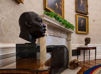 WASHINGTON, DC - January 20: 
A sculpted bust of Dr. Martin Luther King, Jr., adorns a table for an early preview of the redesigned Oval Office awaiting President Joseph Biden at the White House in Washington, DC.
(Photo by Bill O'Leary/The Washington Post via Getty Images)