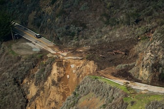 BIG SUR, CA - JANUARY 29:  Highway 1 is destroyed near Rat Creek after a landslide and heavy rains came through the area on Friday, Jan. 29, 2021 in Big Sur, California. (Gabrielle Lurie/The San Francisco Chronicle via Getty Images)