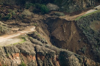 BIG SUR, CA - JANUARY 29:  Highway 1 is destroyed near Rat Creek after a landslide and heavy rains came through the area on Friday, Jan. 29, 2021 in Big Sur, California. (Gabrielle Lurie/The San Francisco Chronicle via Getty Images)