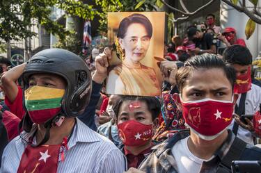 NLD supporter wearing NLD facemask  is seen holding a portrait of Aung San Suu Kyi during the demonstration.
National League for Democracy (NLD) supporters and Thai anti-Coup protesters rally outside Myanmar's embassy after the  Myanmar military seized power from a democratically elected civilian government and arrested its leader Aung San Suu Kyi. The Thai riot police later dispersed the demonstrators. - Peerapon Boonyakiat / SOPA Image//SOPAIMAGES_sopa012574/2102012023/Credit:SOPA Images/SIPA/2102012030