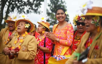People from the island of Niue in the South Pacific welcome the Prince of Wales and the Duchess of Cornwall as they arrive for a wreath laying ceremony at Mount Roskill War Memorial in Auckland, on the second day of the royal visit to New Zealand.
