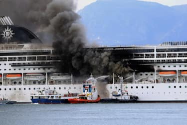 epa09069960 A fire broke out  on the 'MSC Lirica' cruiseship on 12 March 2021, while it was tied at the Corfu port, Ionian Sea, Greece, since January 30 for the winter season. Onboard were crew members only. The cause of the fire, which broke out at starboard, was not made known as of this writing. Firefighters were trying to put out the blaze.  EPA/STAMATIS KATAPODIS
