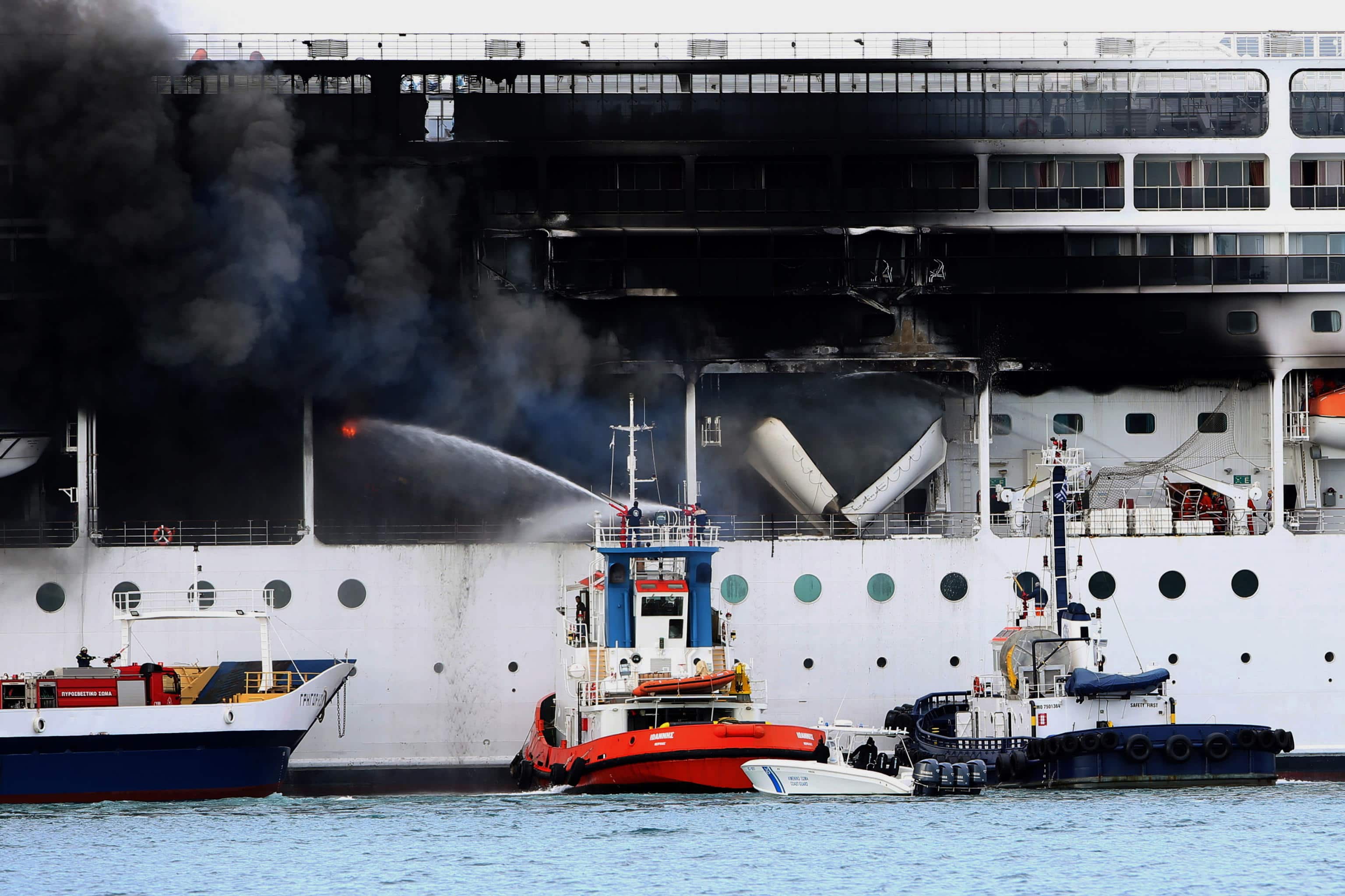 epa09069962 A fire broke out  on the 'MSC Lirica' cruiseship on 12 March 2021, while it was tied at the Corfu port, Ionian Sea, Greece, since January 30 for the winter season. Onboard were crew members only. The cause of the fire, which broke out at starboard, was not made known as of this writing. Firefighters were trying to put out the blaze.  EPA/STAMATIS KATAPODIS