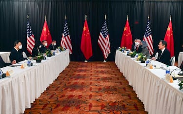 US Secretary of State Antony Blinken (2nd R), joined by National Security Advisor Jake Sullivan (R), speaks while facing Yang Jiechi (2nd L), director of the Central Foreign Affairs Commission Office, and Wang Yi (L), China's Foreign Minister at the opening session of US-China talks at the Captain Cook Hotel in Anchorage, Alaska on March 18, 2021. - China's actions "threaten the rules-based order that maintains global stability," US Secretary of State Antony Blinken said Thursday at the opening of a two-day meeting with Chinese counterparts in Alaska. (Photo by Frederic J. BROWN / POOL / AFP) (Photo by FREDERIC J. BROWN/POOL/AFP via Getty Images)