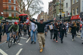 LONDON, UNITED KINGDOM - 2021/03/20: A protester shouting slogans while gesturing during the demonstration.
Thousands of people had illegally gathered for anti-lockdown demonstration in London, breaking national lockdown rules. (Photo by Thomas Krych/SOPA Images/LightRocket via Getty Images)