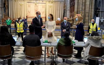 58763342 The Duke and Duchess of Cambridge speak to staff during a visit to the vaccination centre at Westminster Abbey, London, to pay tribute to the efforts of those involved in the Covid-19 vaccine rollout. Picture date: Tuesday March 23, 2021.