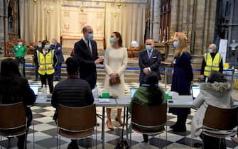 The Duke and Duchess of Cambridge speak to staff during a visit to the vaccination centre at Westminster Abbey, London, to pay tribute to the efforts of those involved in the Covid-19 vaccine rollout. Picture date: Tuesday March 23, 2021.