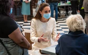 The Duchess of Cambridge speaks to a member of the public during a visit to the vaccination centre at Westminster Abbey, London, to pay tribute to the efforts of those involved in the Covid-19 vaccine rollout. Picture date: Tuesday March 23, 2021.