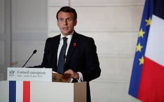 epa09097985 French President Emmanuel Macron speaks during a press conference after a European Council summit held over video-conference at the Elysee Palace in Paris, France, 25 March 2021.  EPA/BENOIT TESSIER / POOL  MAXPPP OUT
