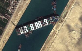 STUCK SHIP EVER GIVEN, SUEZ CANAL -- MARCH 27, 2021:  Maxar’s WorldView-3 collected new high-resolution satellite imagery of the Suez canal and the container ship (EVER GIVEN) that remains stuck in the canal north of the city of Suez, Egypt.  Please use: Satellite image (c) 2020 Maxar Technologies.