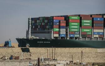 29 March 2021, Egypt, Suez: The "Ever Given" container ship operated by the Evergreen Marine Corporation, sails through the Suez Canal, after it was fully freed and floated. Egypt's Suez Canal Authority announced that the stranded massive container ship that has blocked the Suez Canal for nearly a week, has been fully dislodged and successfully floating in the canal. Photo: Mohamed Shokry/dpa (Photo by Mohamed Shokry/picture alliance via Getty Images)
