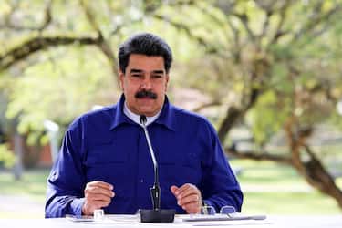 epa09089009 A handout photo made available by the Miraflores press shows the President of Venezuela Nicolas Maduro, while giving a statement, in Caracas, Venezuela, 21 March 2021. Maduro, announced on 21 March a set of restrictive measures to tighten the national quarantine, in view of the increase in covid-19 infections in the Caribbean country, which has been described by the Executive as a 'second wave' of contagions. EPA/Miraflores Press HANDOUT (MANDATORY CREDIT) HANDOUT EDITORIAL USE ONLY/NO SALES