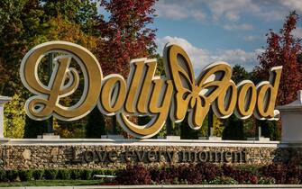 PIGEON FORGE, TN - OCTOBER 18:  The entrance to Dollywood is viewed on October 18, 2016 in Pigeon Forge, Tennessee. Located near the entrance to Great Smoky Mountains National Park, this tourist resort community is home to Dollywood and other entertainment and roadside attractions. (Photo by George Rose/Getty Images)