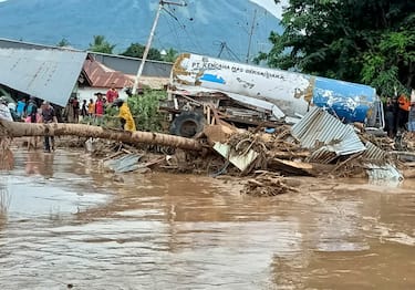 epa09116324 A handout photo made available by East Adonara Police station shows a general view of the aftermath of a flash flood in Adonara, East Flores, Indonesia, 04 April 2021 (issued 05 April 2021). According to the Indonesian National Board for Disaster Management (BNPB), more than 50 people were killed and some others missing after flash floods in several areas in East Nusa Tenggara province. EPA/EAST ADONARA POLICE STATION / HA HANDOUT EDITORIAL USE ONLY/NO SALES