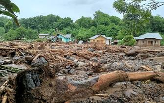 TOPSHOT - This general view shows debris left behind in the town of Adonara in East Flores on April 4, 2021, after flash floods and landslides swept eastern Indonesia and neighbouring East Timor. (Photo by Joy Christian / AFP) (Photo by JOY CHRISTIAN/AFP via Getty Images)