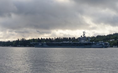 Bremerton, WA - APRIL 27: The USS Nimitz (CVN-68) gets underway through Sinclair Inlet from Naval Base Kitsap on April 27, 2020 in Bremerton, WA.  (Photo by Jeff Halstead/Icon Sportswire)