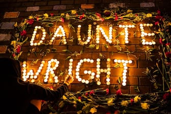 SEATTLE, WA - APRIL 12: A display of candles and flowers spells the name of Daunte Wright at a protest over his death on April 12, 2021 in Seattle, Washington. Wright, a Black man whose car was stopped in Brooklyn Center, Minnesota on Sunday reportedly for an expired registration, and not far from where George Floyd was killed during an arrest in Minneapolis last May, was shot and killed by an officer who police say mistook her service revolver for a Taser.  (Photo by David Ryder/Getty Images)