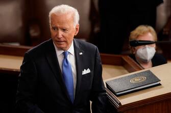 epa09166500 President Joe Biden turns from the podium after speaking to a joint session of Congress in the House Chamber at the U.S. Capitol in Washington, DC, USA, 28 April 2021.  EPA/Andrew Harnik / POOL Pool Image