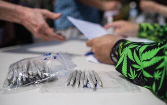Marijuana activists hand out free joints to vaccinated New Yorkers on April 20, 2021 in New York City. (Photo by Angela Weiss / AFP) (Photo by ANGELA WEISS/AFP via Getty Images)