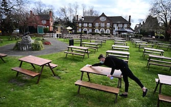 epa09122478 A pub prepares to open its garden after months of COVID-19 coronavirus lockdown in London, Britain, 08 April 2021. The UK is set to begin its second phase of unlocking, the government has announced. Pubs, restaurants and shops will reopen from 12 April.  EPA/ANDY RAIN