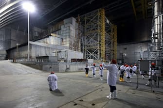 KYIV REGION, UKRAINE - APRIL 15, 2021 - The New Safe Confinement seals off the Object Shelter, also known as the Sarcophagus, a temporary structure built in 1986 over the debris of the 4th reactor of the Chornobyl Nuclear Power Plant (ChNPP), Kyiv Region, northern Ukraine. (Photo credit should read Volodymyr Tarasov/ Ukrinform/Barcroft Media via Getty Images)