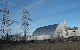 epa08192915 The new protective shelter over the remains of the nuclear reactor Unit 4 at the Chernobyl nuclear power plant, is seen in Chernobyl, Ukraine, 04 February 2020. Fifty former inhabitants of Prypyat met with fifty tourists from different countries on the central square of the city during celebration of the 50th birthday of a ghost-town Pripyat at Chernobyl Exclusion Zone. The city was founded on 04 February 1970 to serve the nearby Chernobyl Nuclear Power Plant. Some 47,000 people of the city of Prypyat were evacuated after the explosion on 26 April 1986. The explosion of Unit 4 of the Chernobyl nuclear power plant in the early hours of 26 April 1986 is still regarded as the biggest accident in the history of nuclear power generation.  EPA/SERGEY DOLZHENKO