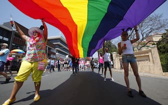 epa04098852 (FILE) A file picture dated 06 October 2012 shows some of the thousands of gay and lesbian participants march through the streets during the annual Gay Pride March, in Johannesburg, South Africa. Ugandas President Yoweri Museveni signed into law on 24 February 2014 anti-gay legislation that allows homosexuals to be punished with up to life in prison. The law has come under strong criticism abroad, with US President Barack Obama warning that it could 'complicate' Ugandas relations with one of its biggest aid donors.  EPA/KIM LUDBROOK