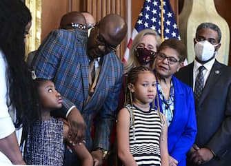 Philonise Floyd, George Floyd's brother, center, speaks with Gianna Floyd, George Floyd's daughter, second left, while meeting with U.S. House Speaker Nancy Pelosi, a Democrat from California, not pictured, at the U.S. Capitol in Washington, D.C., U.S., on Tuesday, May 25, 2021. President BidenÂ is set to meet privately this afternoon with theÂ FloydÂ family one year after his death, with negotiators working on policing legislation in Congress still stuck on how to hold law enforcement officers accountable for excessive use of force. Photographer: Errin Scott/Reuters/Bloomberg via Getty Images