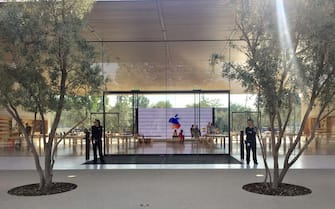 (170912) -- CUPERTINO (U.S.), Sept. 12, 2017 () -- Security personnel are seen inside Apple Park as a special event is held in Cupertino, California, the United States on Sept. 12, 2017. Apple Inc. released a series of new products and services in Cupertino on Tuesday. (/Dong Xudong)