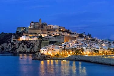 Ibiza Town and the cathedral of Santa Maria d'Eivissa at night in the Balearic Islands of Spain. (Photo by: John Greim/Loop Images/Universal Images Group via Getty Images)