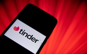 In this photo illustration Tinder logo is displayed on a smartphone screen in Athens, Greece on April 13, 2021 (Photo Illustration by Nikolas Kokovlis/NurPhoto via Getty Images)