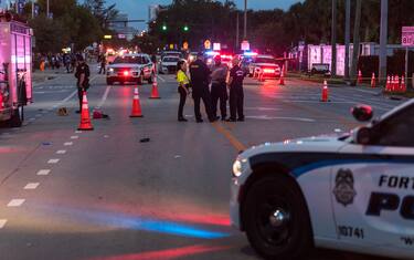 WILTON MANORS, FLORIDA - JUNE 19:  Police investigate the scene where a pickup truck drove into a crowd of people at a Pride parade on June 19, 2021 in Wilton Manors, Florida. One person died and one was injured in the incident that is still under investigation. (Photo by Jason Koerner/Getty Images)