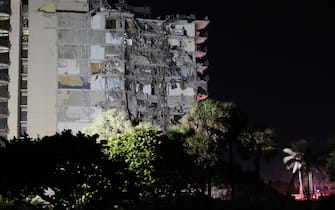 SURFSIDE, FLORIDA - JUNE 24:  A portion of the 12-story condo tower crumbled to the ground during a partial collapse of the building on June 24, 2021 in Surfside, Florida. It is unknown at this time how many people were injured as search-and-rescue effort continues with rescue crews from across Miami-Dade and Broward counties. (Photo by Joe Raedle/Getty Images)