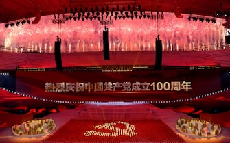 1233706720 Fireworks explode during a Cultural Performance as part of the celebration of the 100th Anniversary of the Founding of the Communist Party of China, at the Bird's nest national stadium in Beijing on June 28, 2021. - The 100th anniversary is scheduled for July 1. (Photo by NOEL CELIS / AFP) (Photo by NOEL CELIS/AFP via Getty Images)