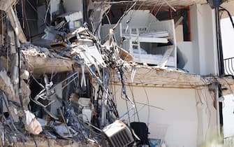 SURFSIDE, FLORIDA - JULY 03: A general view of the partially collapsed 12-story Champlain Towers South condo building on July 03, 2021 in Surfside, Florida. Over one hundred people are being reported as missing as the search-and-rescue effort continues. (Photo by Michael Reaves/Getty Images)