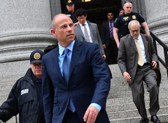 Michael Avenatti, attorney and founding partner of Eagan Avenatti LP, second left, exits from federal court in New York, U.S., on Tuesday, May 28, 2019. AvenattiÂ pleaded not guilty to charges that he misappropriated thousands of dollars from his most famous client, adult-film star Stormy Daniels, as the embattled attorney's legal troubles pile up from coast to coast. Avenatti was arrested in New York in March and charged with extorting millions of dollars from Nike Inc. Photographer: Louis Lanzano/Bloomberg via Getty Images