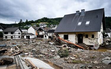 epa09345882 The   village of Schuld in the district of Ahrweiler is destroyed after heavy flooding of the river Ahr, in Schuld, Germany, 15 July 2021. Large parts of Western Germany were hit by heavy, continuous rain in the night to 15 July, resulting in local flash floods that destroyed buildings and swept away cars.  EPA/SASCHA STEINBACH