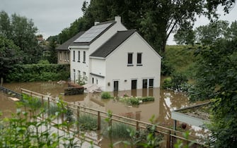 GEULLE, NETHERLANDS - JULY 16: House pictured in a flooded street on July 16, 2021 in Geulle, Netherlands. The flooding has been caused by unusually heavy rain in the hilly parts of Germany and the Ardennes region in Belgium. In Germany the death toll has now passed 100 with dozens more missing. Rescue and evacuation operations are now underway in tricky conditions across the affected regions. (Photo by Sanne Derks/Getty Images)
