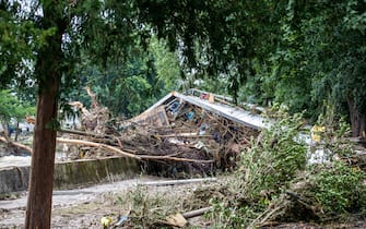 epa09349671 A destroyed bridge after flooding in Bad Neuenahr, Germany, 16 July 2021. Large parts of Western Germany were hit by heavy, continuous rain in the night to Wednesday, resulting in local flash floods that destroyed buildings and swept away cars.  EPA/CONSTANTIN ZINN