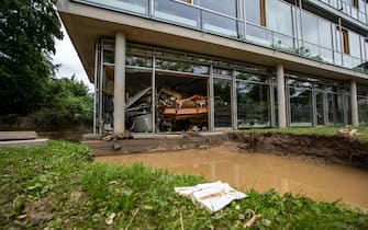 epa09349670 A damaged school after flooding in Bad Neuenahr, Germany, 16 July 2021. Large parts of Western Germany were hit by heavy, continuous rain in the night to Wednesday, resulting in local flash floods that destroyed buildings and swept away cars.  EPA/CONSTANTIN ZINN