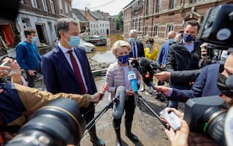 BELGIUM WEATHER FLOODS epa09350052 European Commission President Ursula von der Leyen (C) visits flooded places in Pepinster, Belgium, 17 July 2021. Heavy rains have caused widespread damage and flooding in parts of Belgium. EPA/JULIEN WARNAND