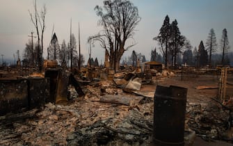 GREENVILLE, CA - AUGUST 08:  The last of the day’s light makes the burned landscape glow on August 8, 2021 in GREENVILLE, California. On July 5, 2021 the Dixie Fire swept through Greenville, California destroying homes, historic buildings and forcing hundreds to evacuate. (Photo by Maranie R. Staab/Getty Images)