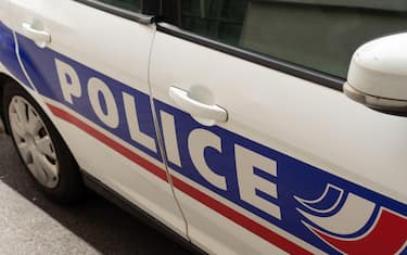 Close-up shot of the word "Police" written on the side of a patrol vehicle of the french national police, France