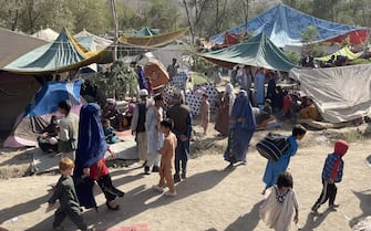 1234621694 KABUL, AFGHANISTAN-AUGUST 11: Thousands of displaced families suffer hardships in a park in Kabul, Afghanistan, on August 11, 2021. Approximately 30,000 families have been displaced due to govt and Taliban clashes in the northern provinces. (Photo by Haroon Sabawoon/Anadolu Agency via Getty Images)
